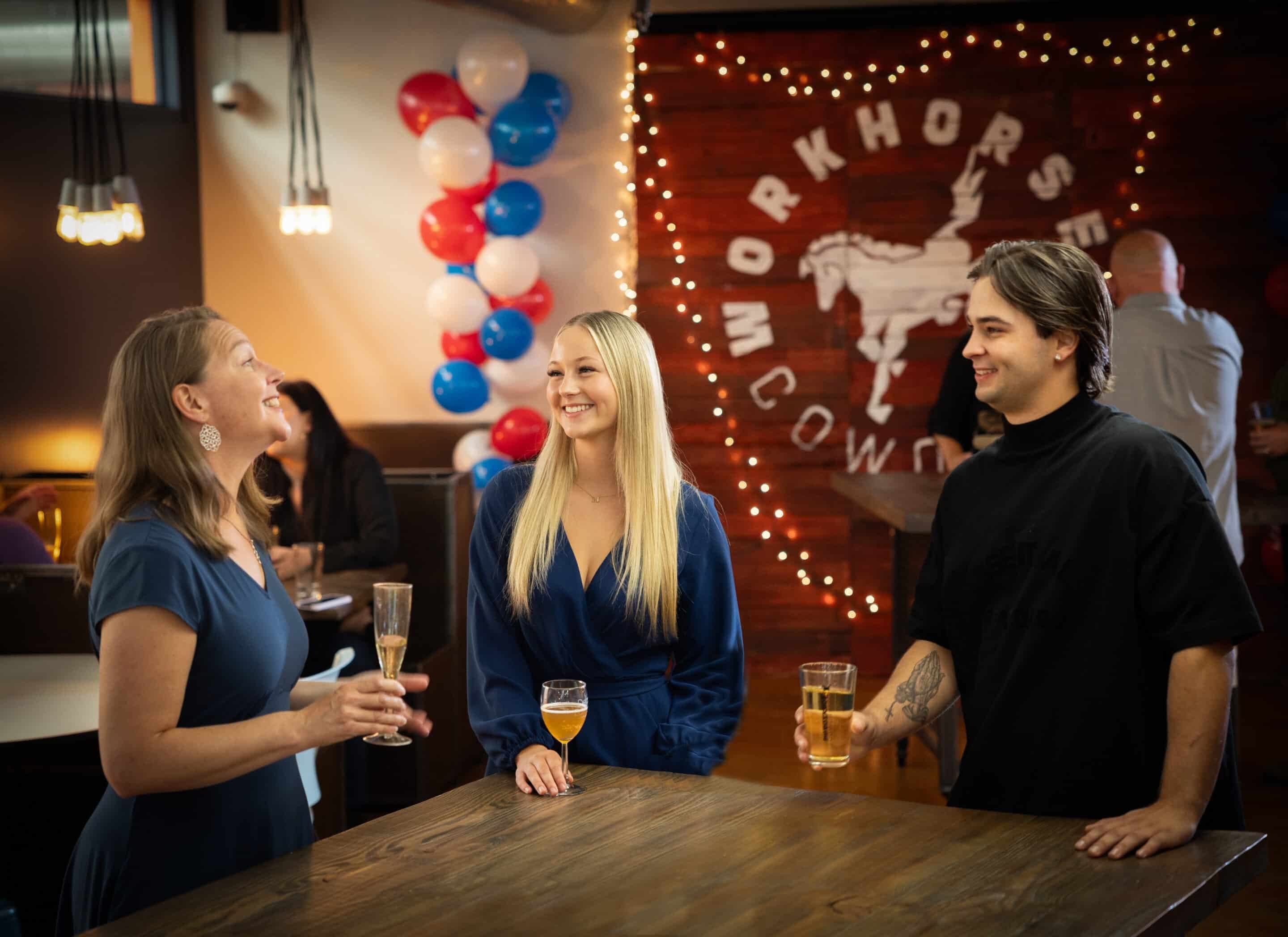Group of people talking at a party